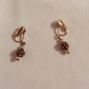 Clip-on earrings. Gold and purple